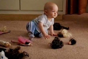 Baby Mikey w/decapitated Barbies