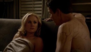 Sookie Stackhouse (Anna Paquin) gets cozy with Bill Compton (Stephen Moyer) in HBO's True Blood Season 7 Episode 8 (entitled 'Almost Home')