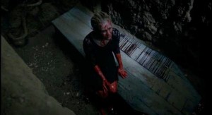 Sookie sitting on Bills coffin in the HBO True Blood finale Episode 10 (entitled 'Thank You')